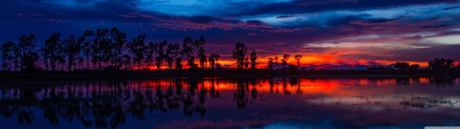 5120×1440 Resolution: Serene Sunset Reflections on Water Wallpaper