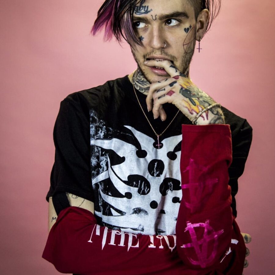 Lil Peep: Inked Melodies on Pink Canvas Wallpaper